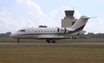 N231QS @ KORL - Challenger 650 zx NAS-ORL - by Florida Metal