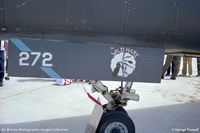 68-0272 @ YXU - The Wild Hate artwork on nose gear door - by George Trussell