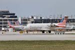 N415AW @ KORD - CRJ2 Air Wisconsin/ American Eagle BOMBARDIER INC CL-600-2B19 N415AW AWI6032 TYS-ORD - by Mark Kalfas