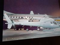 N240BN @ OI - Ocala in Florida Before searial #1 being scraped out, was used as a back drop setting on Miami Vice episode, photo with helicopter - by Everett Sicks