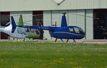 G-RAWM @ EGLD - Robinson R44 Raven II at Denham.