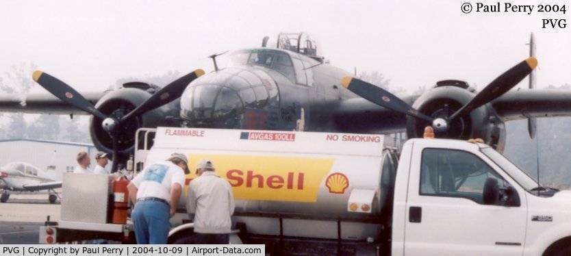 Hampton Roads Executive Airport (PVG) - Hampton Roads Executive's fuel truck servicing a thirsty B-25J
