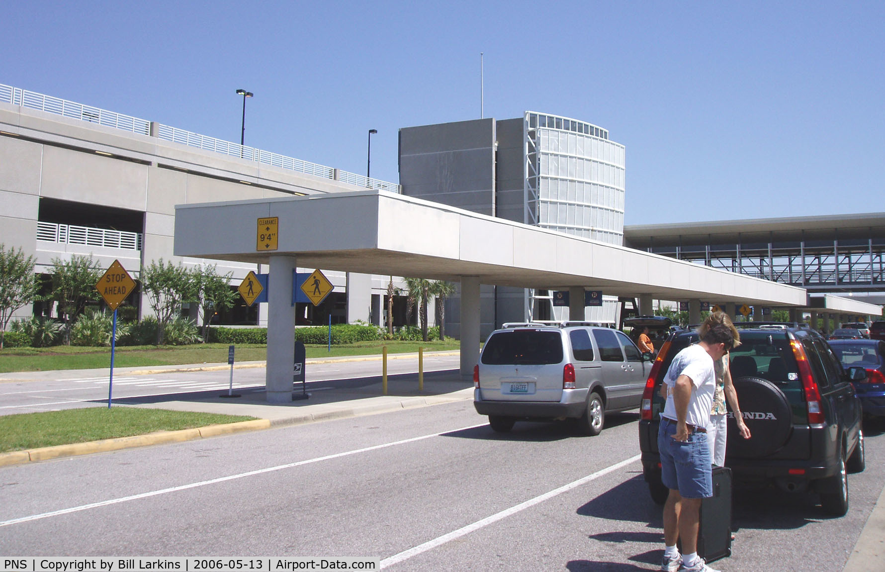 Pensacola Gulf Coast Regional Airport (PNS) - Street entrance with garage on left.