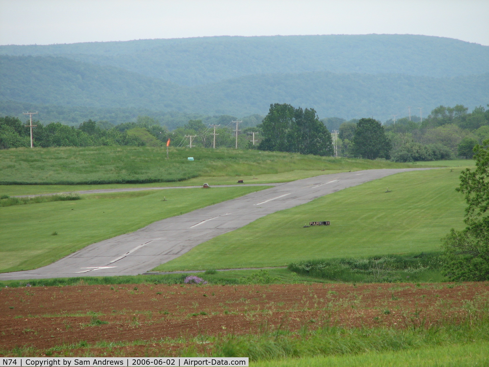 Penns Cave Airport (N74) - approach end to rwy7 from the next hill over