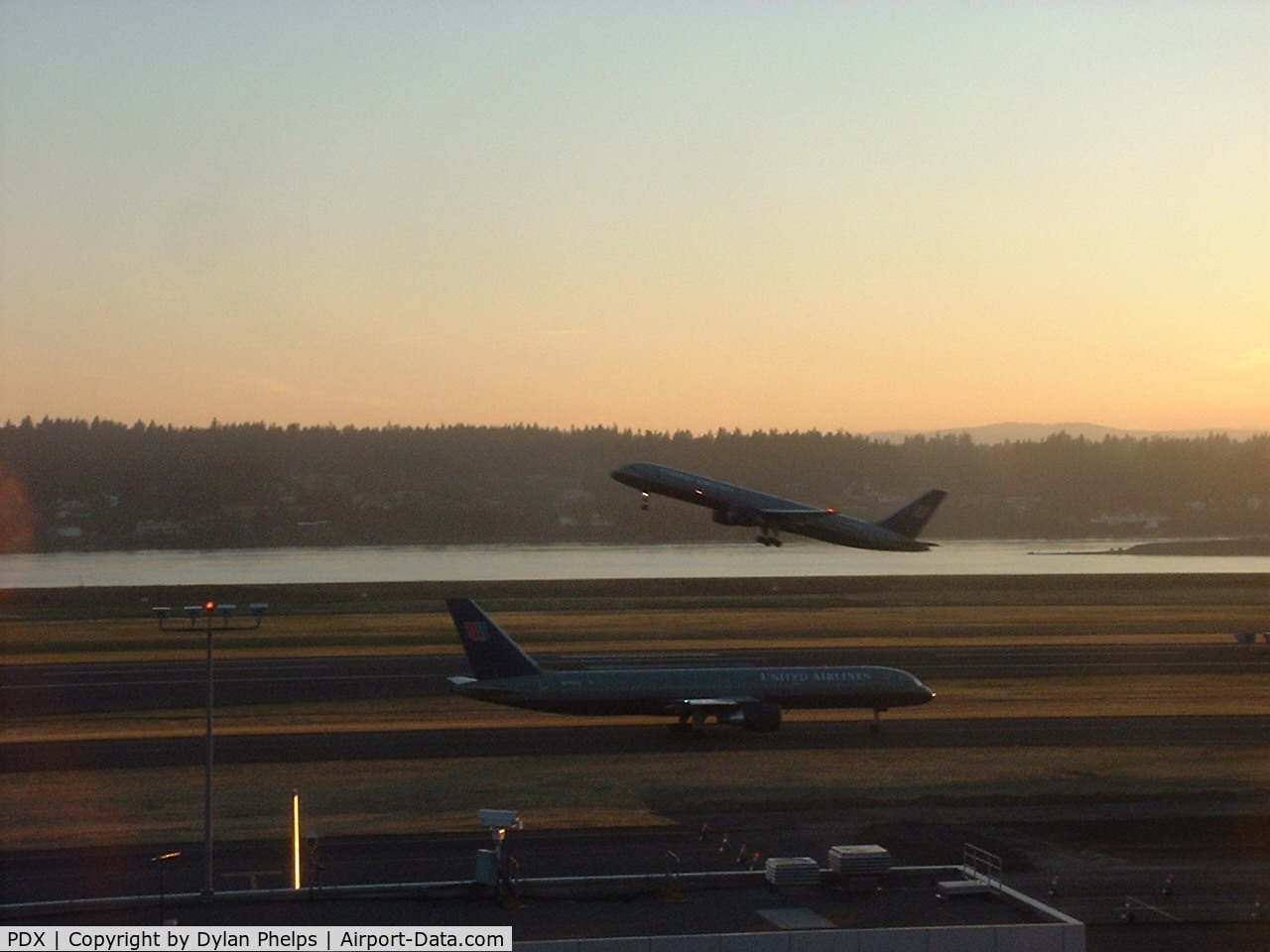 Portland International Airport (PDX) - Two UA 757-200's in one frame.