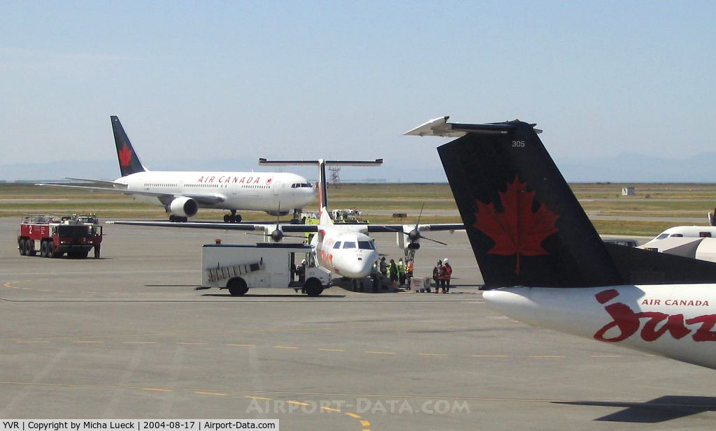 Vancouver International Airport, Vancouver, British Columbia Canada (YVR) - Some incident triggered the fire crew out to Air Canada Jazz's DHC 8