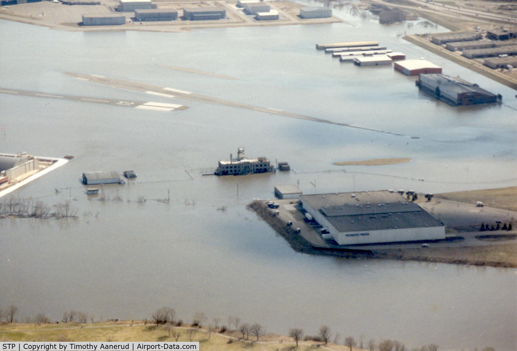 St Paul Downtown Holman Fld Airport (STP) - ~1995 flood at STP.  The Mississippi River floods this airport so often the airport has a procedures manual.  They will even preflood some of the buildings because it's easier to clean up afterwards.