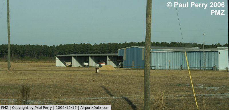 Plymouth Municipal Airport (PMZ) - Another shot of the hangars, with a boat in the nearest one