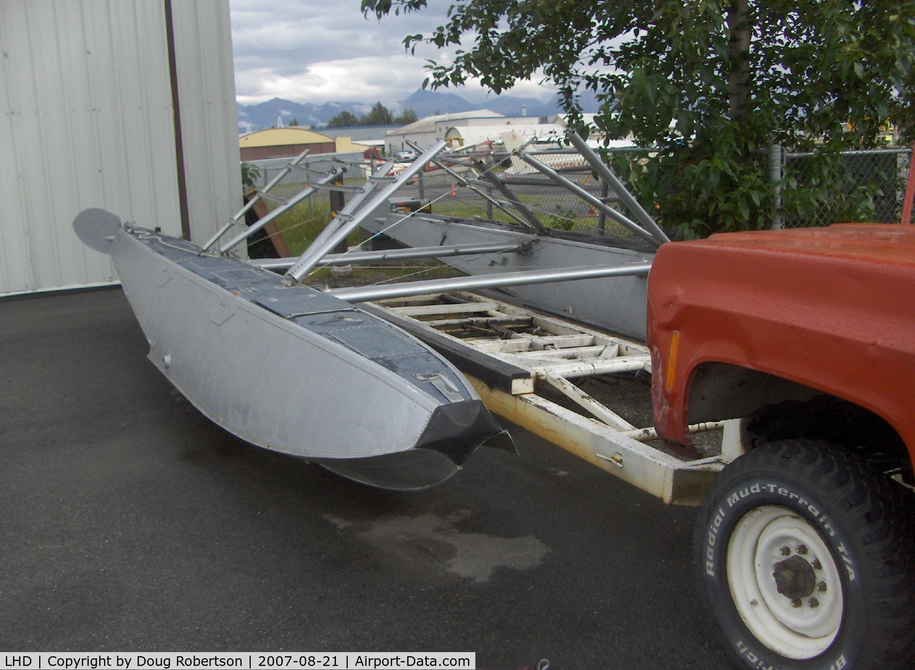 Lake Hood Seaplane Base (LHD) - Highly modified truck with capability to position straight-float plane aircraft out of water. Closeup of carrier body with float set only.