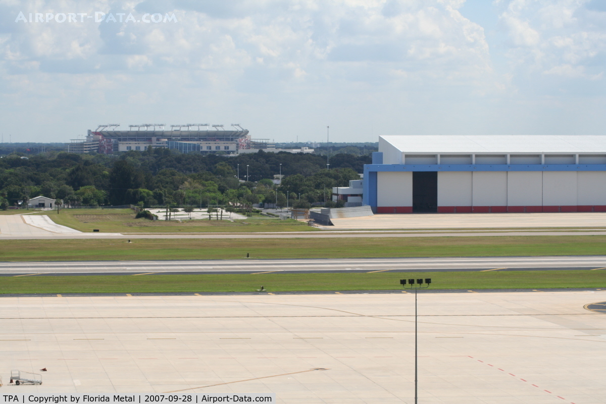 Tampa International Airport (TPA) - hangar with Raymond James Stadium (Tampa Bay Bucs)