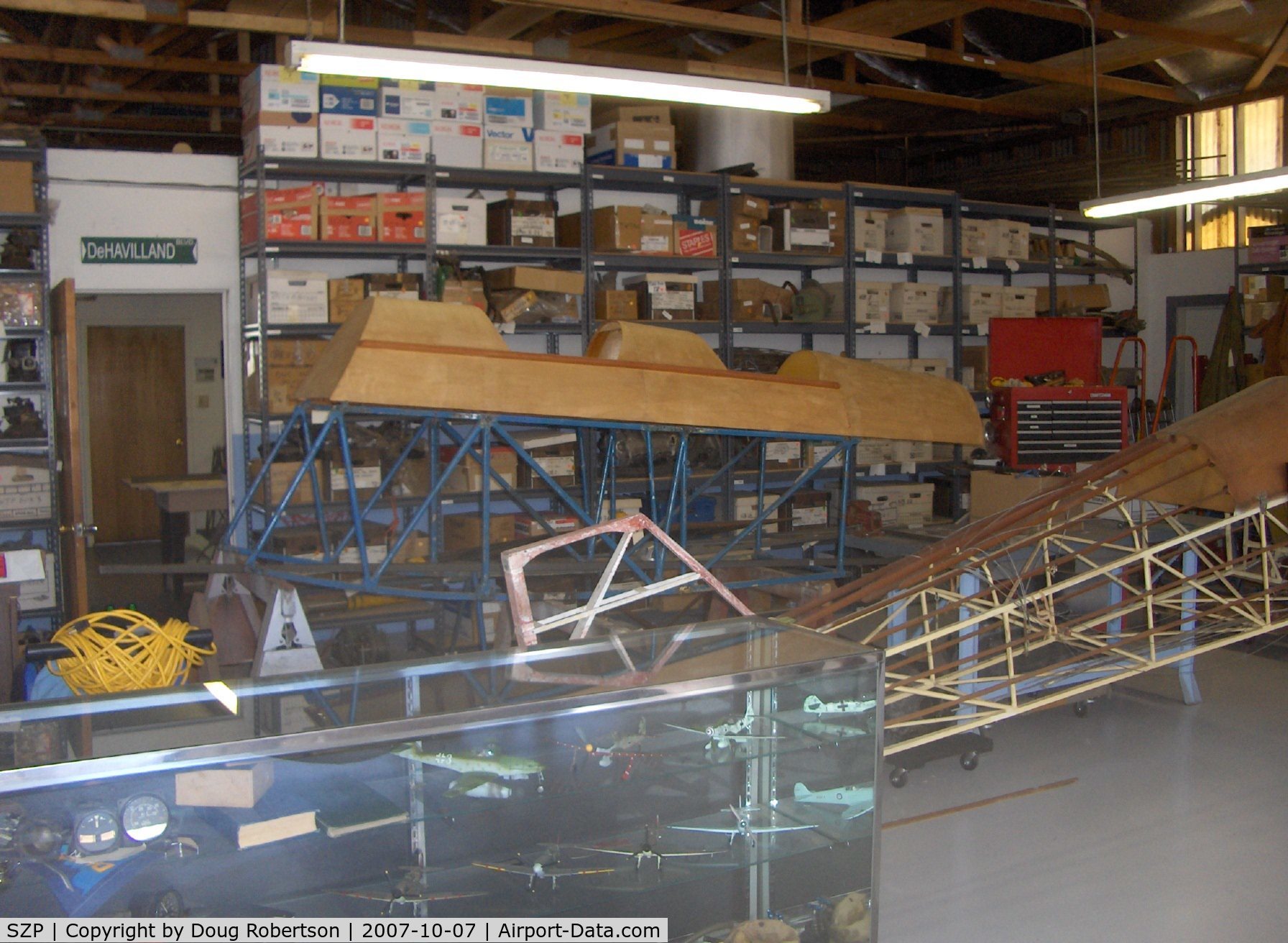Santa Paula Airport (SZP) - DeHavilland Gipsy Moth and Tiger Moth parts in David Watson Museum Hangar