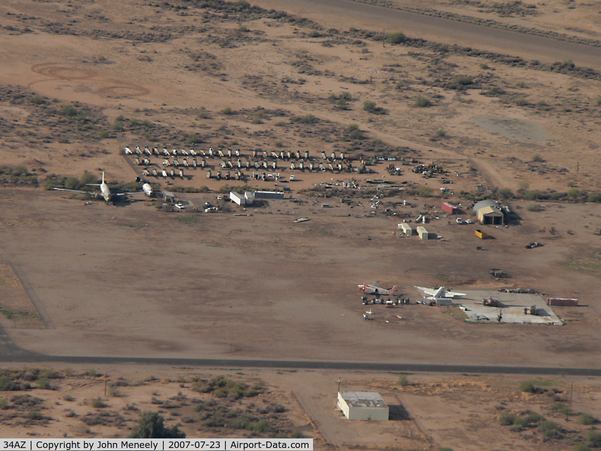 Gila River Memorial Airport (34AZ) - Winding down ... The concrete slab is where the T&G (Air Response) hangar used to be. Some PV2s and a compound full  of H-19s still in evidence.