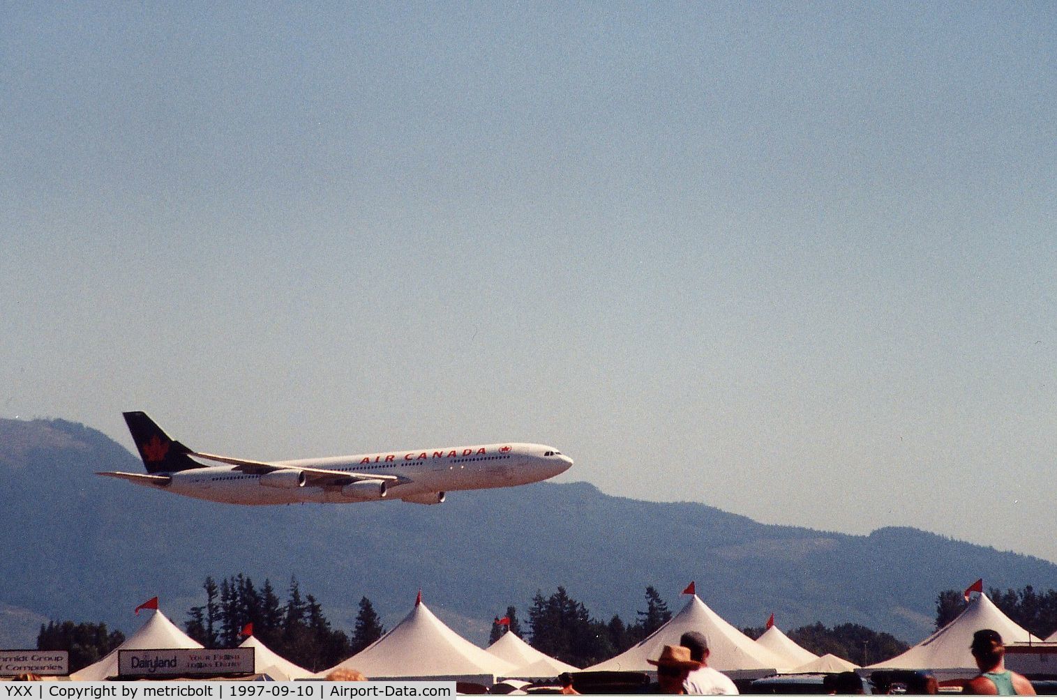 Abbotsford International Airport, Abbotsford, British Columbia Canada (YXX) - Air Canada A340 gear up low level flypast,1997 Abbotsford Int'l Airshow.