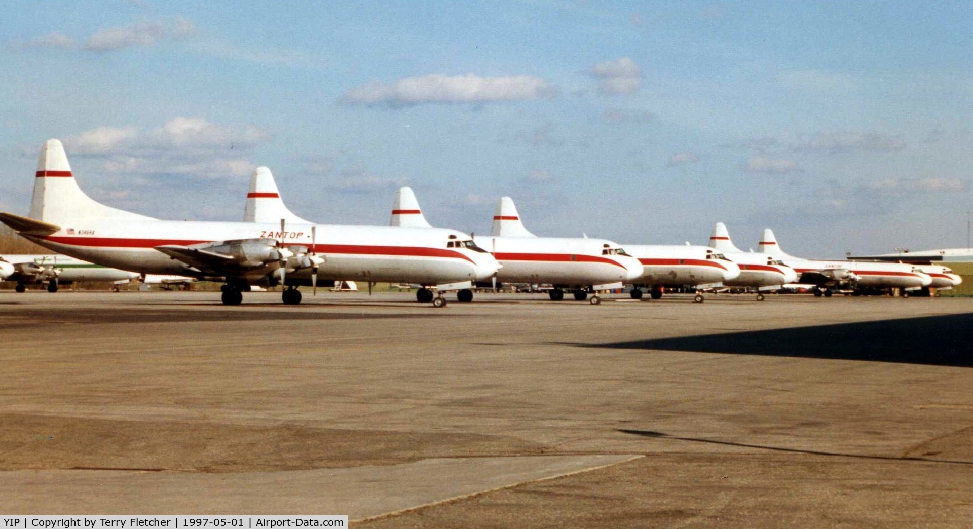 Willow Run Airport (YIP) - Zantop Electras grace the Detroit Willow Run  ramp in 1997