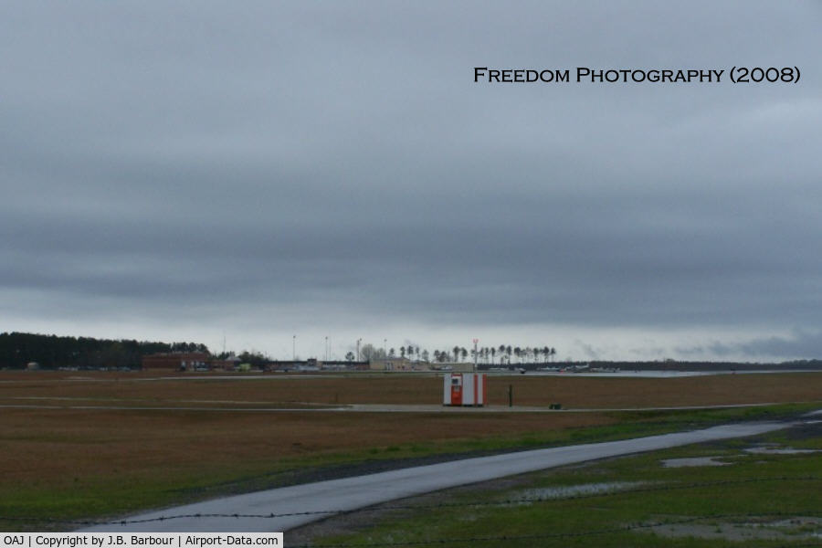 Albert J Ellis Airport (OAJ) - Nice commuter airport.  The rain was keeping a lot of traffic on delay's