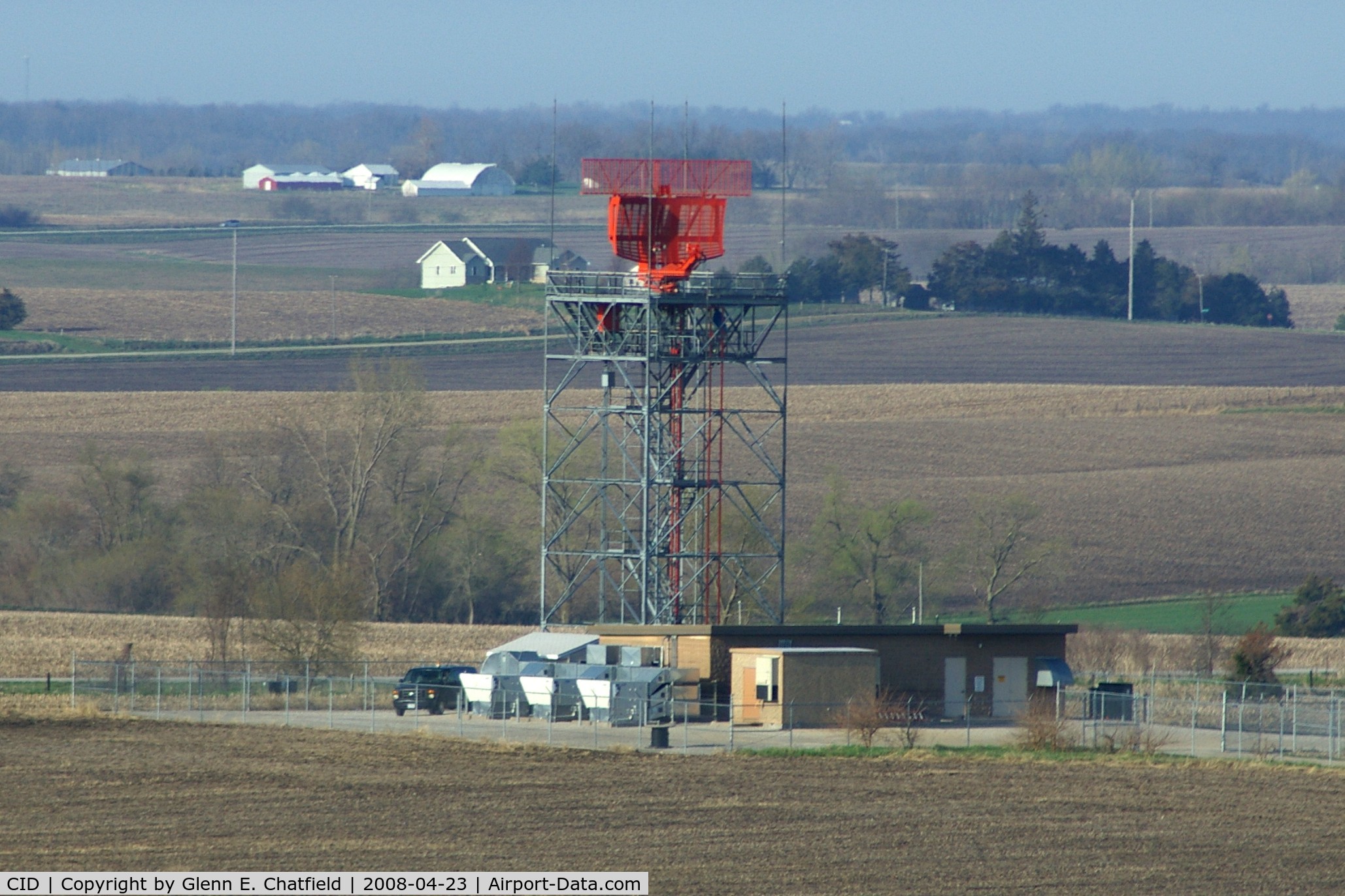 The Eastern Iowa Airport (CID) - Our ASR-9 RADAR as seen from the tower with a telephoto lens.  It's on the south side of runway 9/27