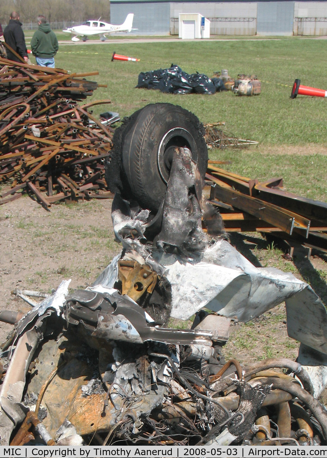 Crystal Airport (MIC) - The remains of a Piper PA-28 after a hangar fire.  Note the fiberglass cloth from the nose wheelpant survived, but the resin has melted away.