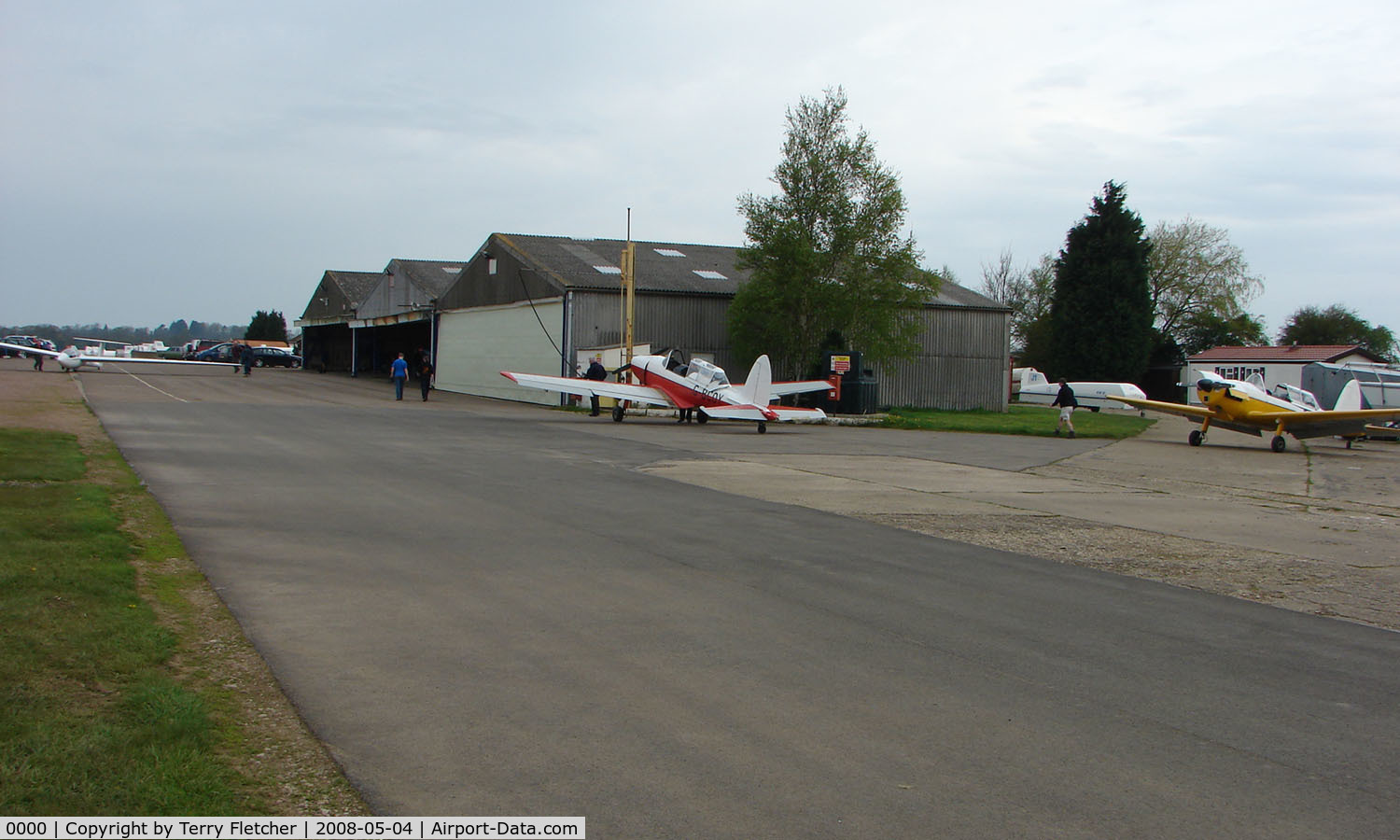 0000 Airport - Early morning at Husband Bosworths , Gliders being towed out the Hangars , Chipmunk towers getting re-fueled