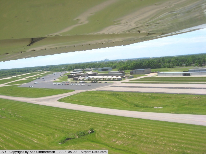 Clark Regional Airport (JVY) - Departing 32 and looking south at downtown Louisville on the horizon.