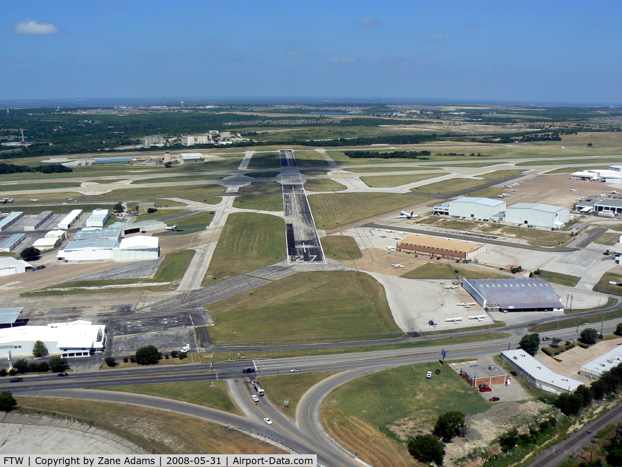 Fort Worth Meacham International Airport (FTW) - Downwind for runway 16 - looking down runway 27 - Meacham Field