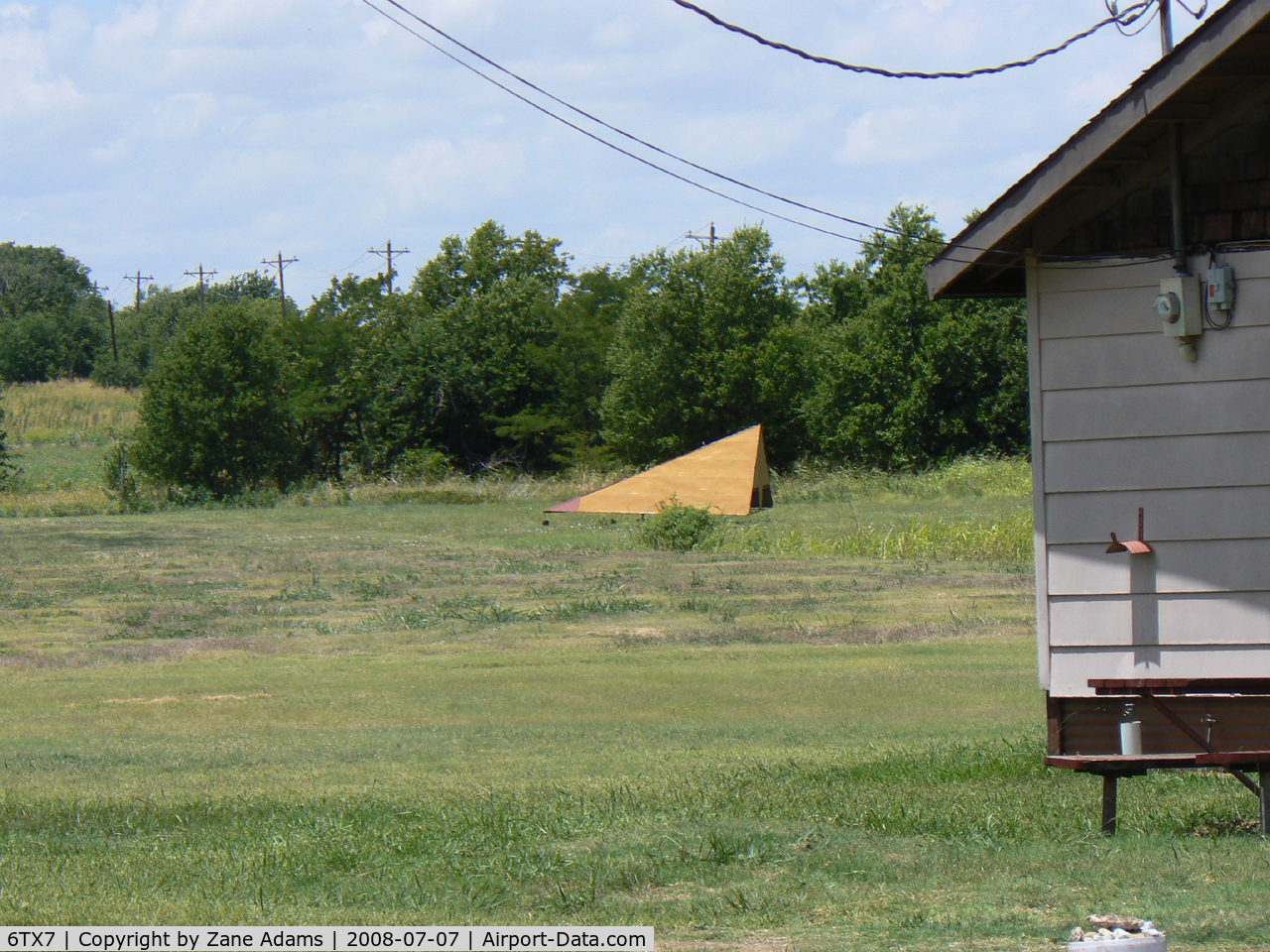 Flying L Airpark Airport (6TX7) - Flying L Private Strip - Unsure weather this airfield is still open. There is a fence and new subdivision of houses built with in yards of the hanger building, there was no airplane in the hanger and I could not see the runway