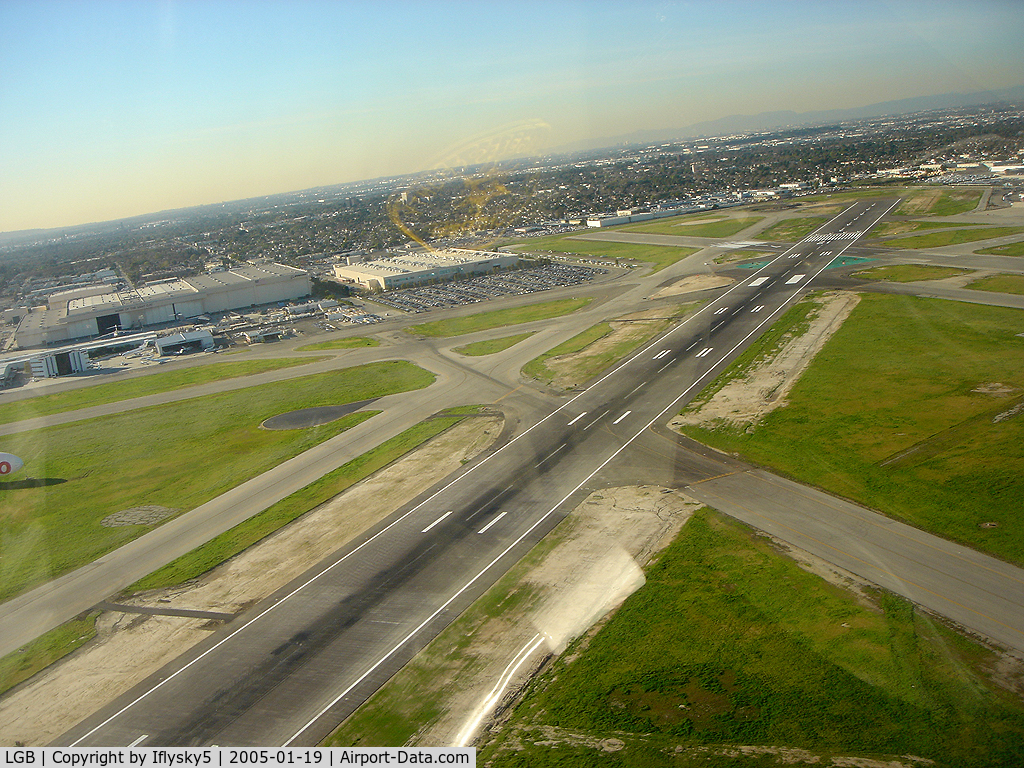Long Beach /daugherty Field/ Airport (LGB) - Crossing runway 25R on departure from LASD heliport