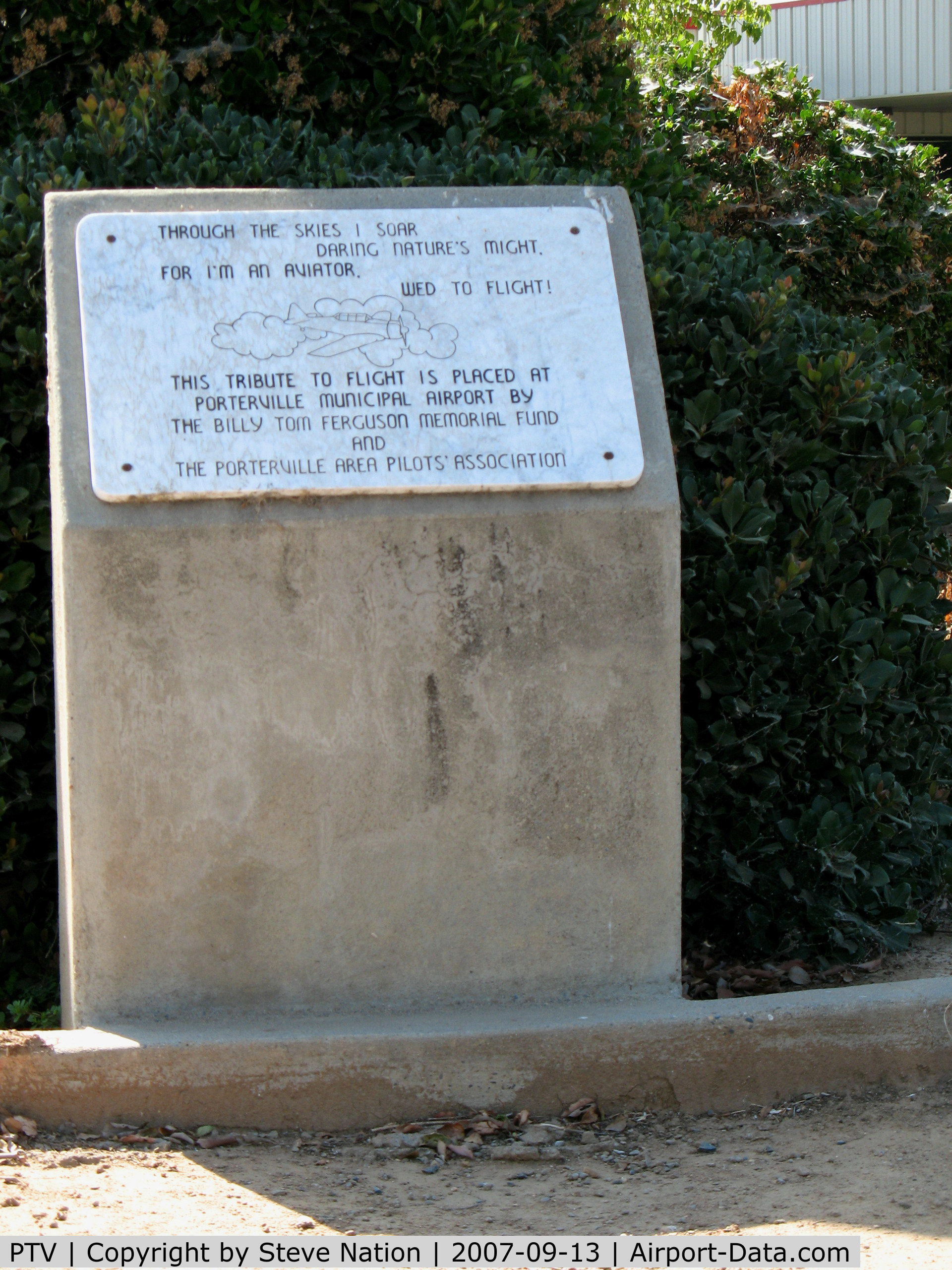 Porterville Municipal Airport (PTV) - Memorial at base of pole-mounted A-4 BuAer 147727 AH/400 USS Oriskany