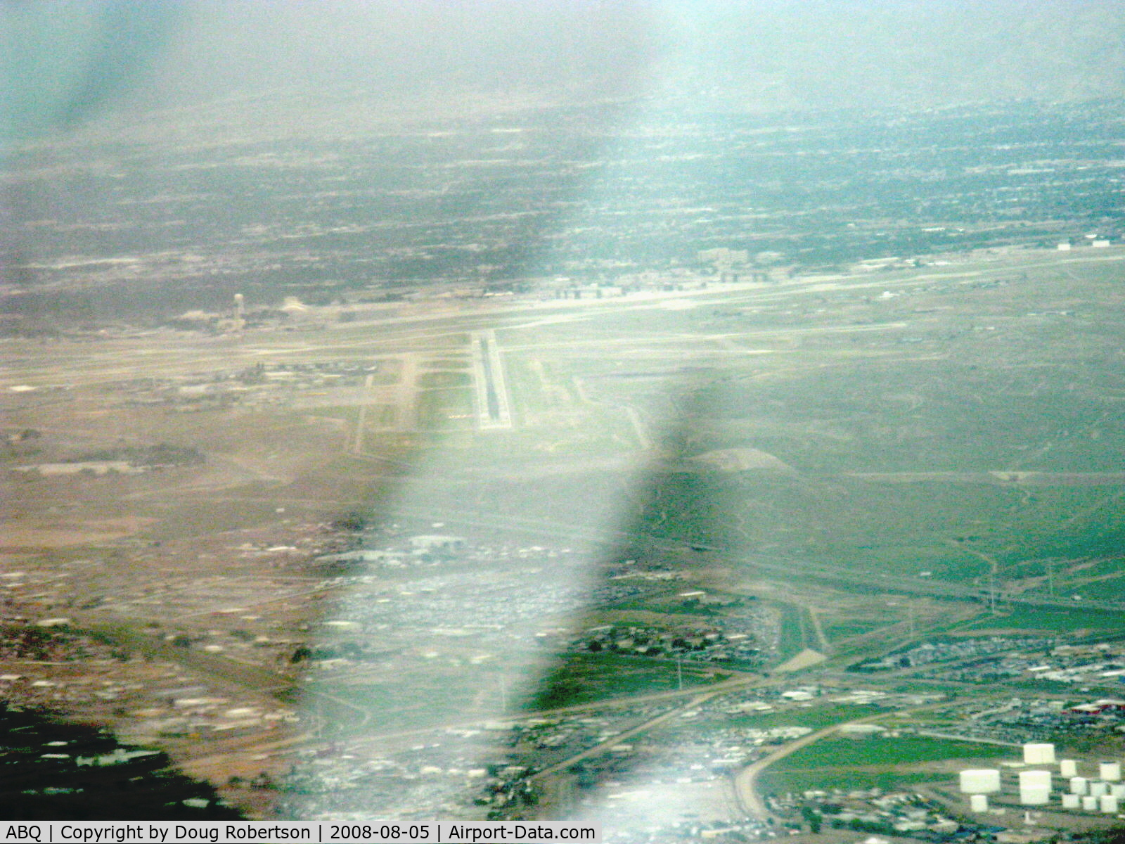 Albuquerque International Sunport Airport (ABQ) - Rainy descent to Rwy 26 in N2111Q Beech BONANZA 36