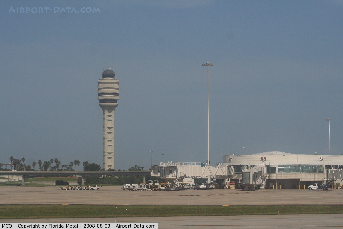 Orlando International Airport (MCO) - Airside 4 and the tower at Orlando International Airport