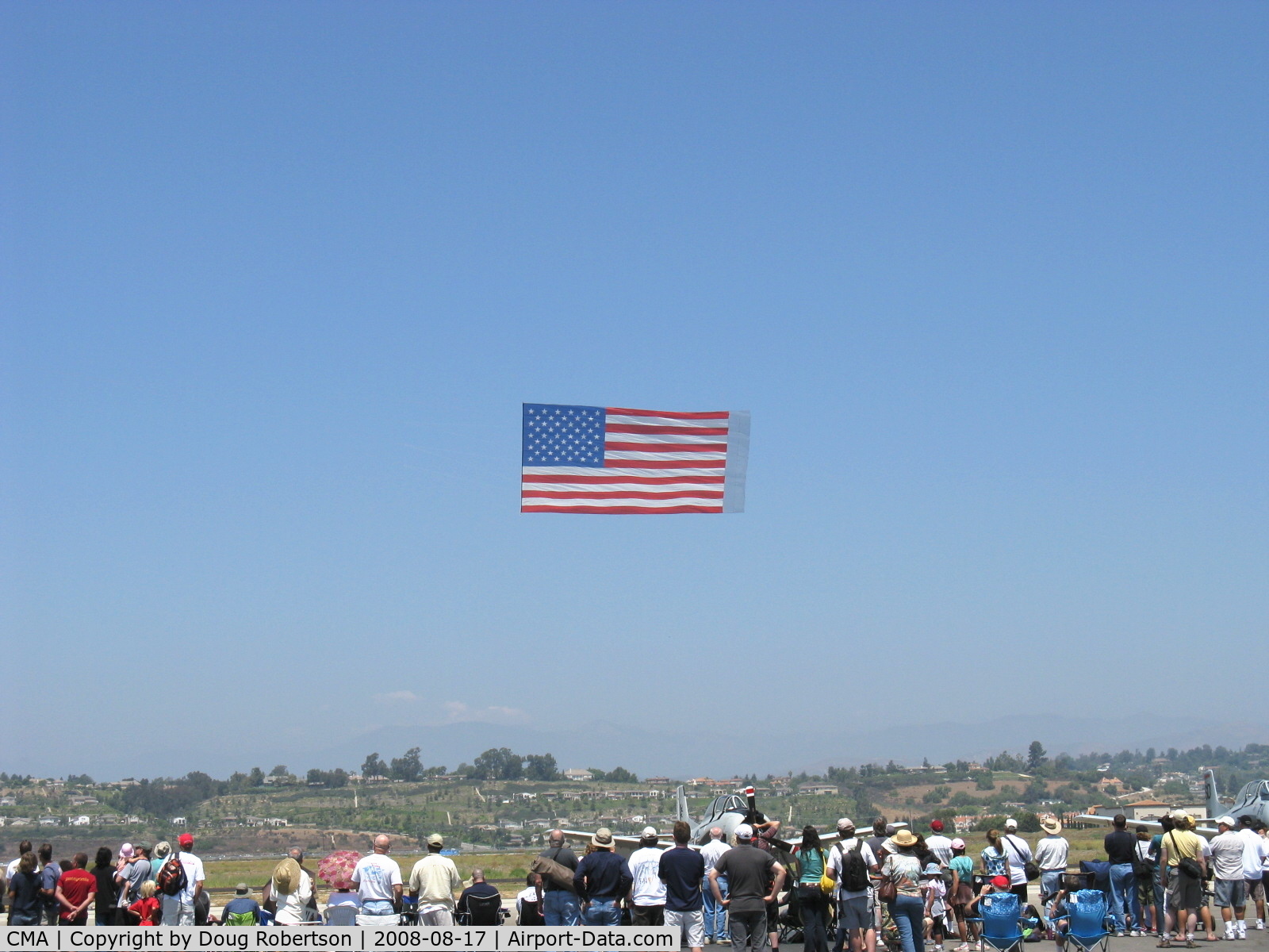 Camarillo Airport (CMA) - Opening the Annual Camarillo EAA Airshow with banner tow Old Glory