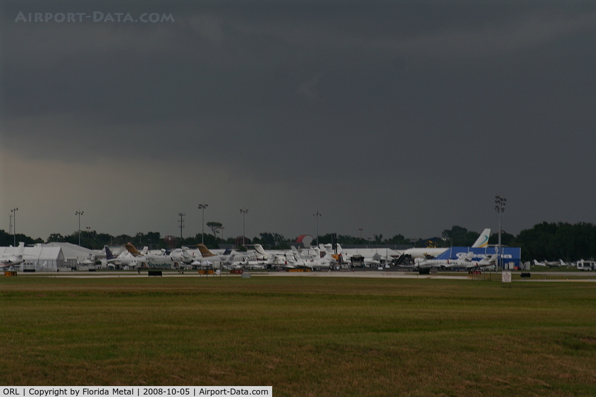 Executive Airport (ORL) - Storm clouds gather over NBAA Orlando