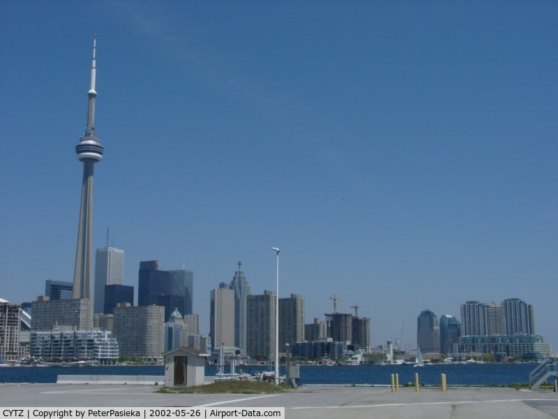 Toronto City Centre Airport, Toronto, Ontario Canada (CYTZ) - Toronto City Centre Airport, Ontario Canada - Open house 2002. View of the CN Tower and the city sky line.