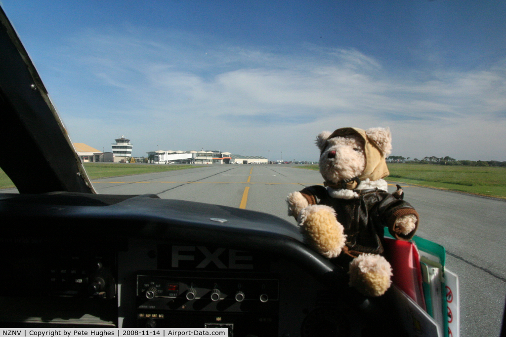 Invercargill Airport, Invercargill New Zealand (NZNV) - Pierre the Pilot, round-the-world bear taxies towards the terminal and tower at Invercargill NZ - see www.bearintheair.org for his story!