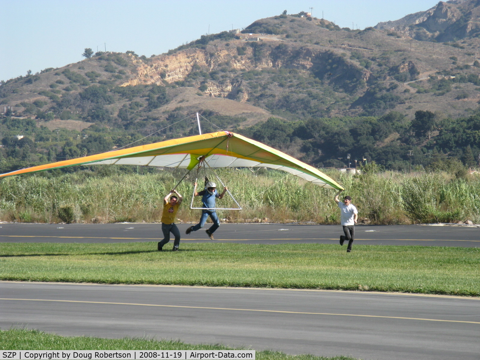 Santa Paula Airport (SZP) - Repealing the Law of Gravity-Hang Glider launching from level ground-Momentary liftoff with helping push