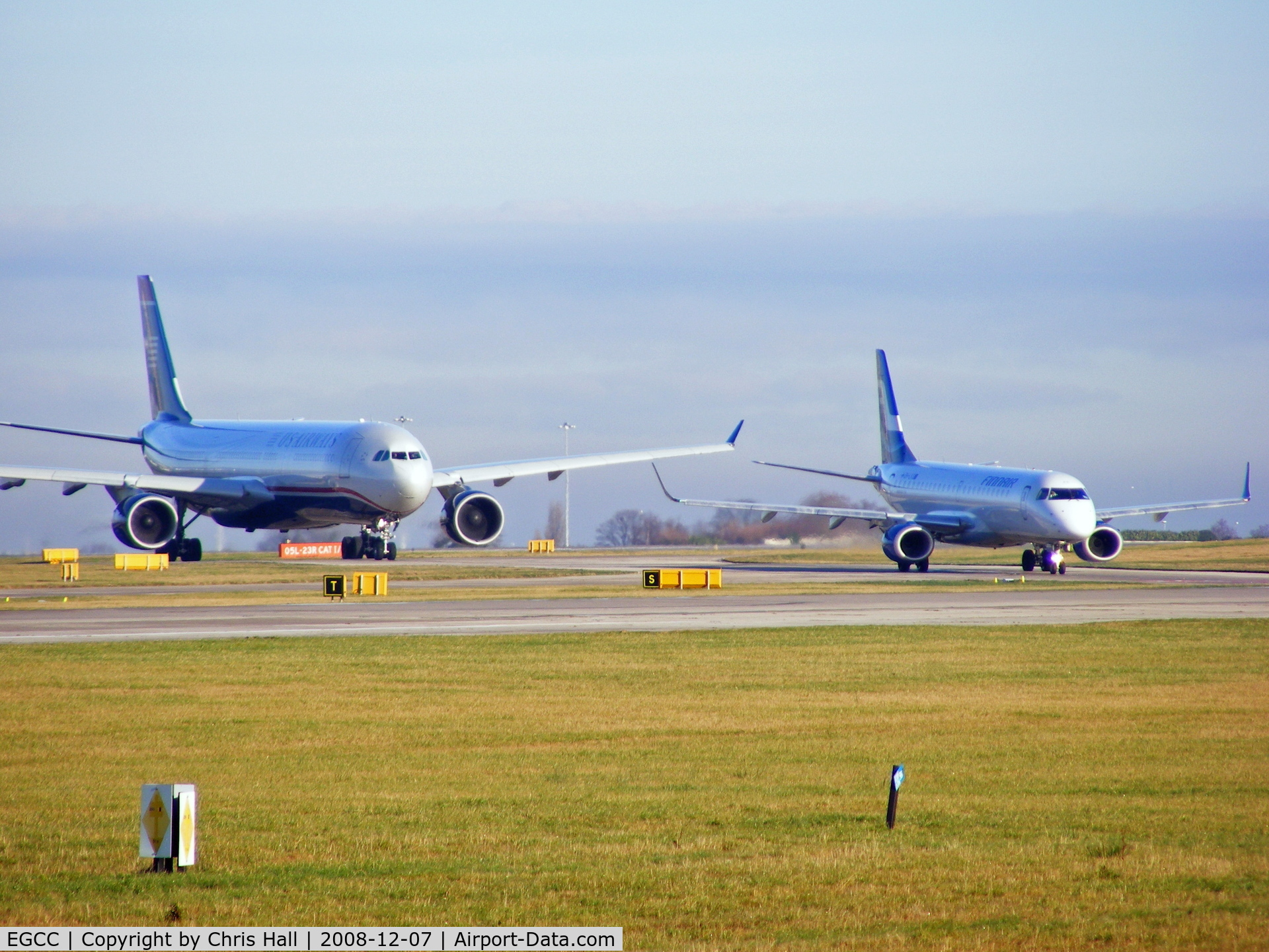 Manchester Airport, Manchester, England United Kingdom (EGCC) - N271AY and OH-OKG