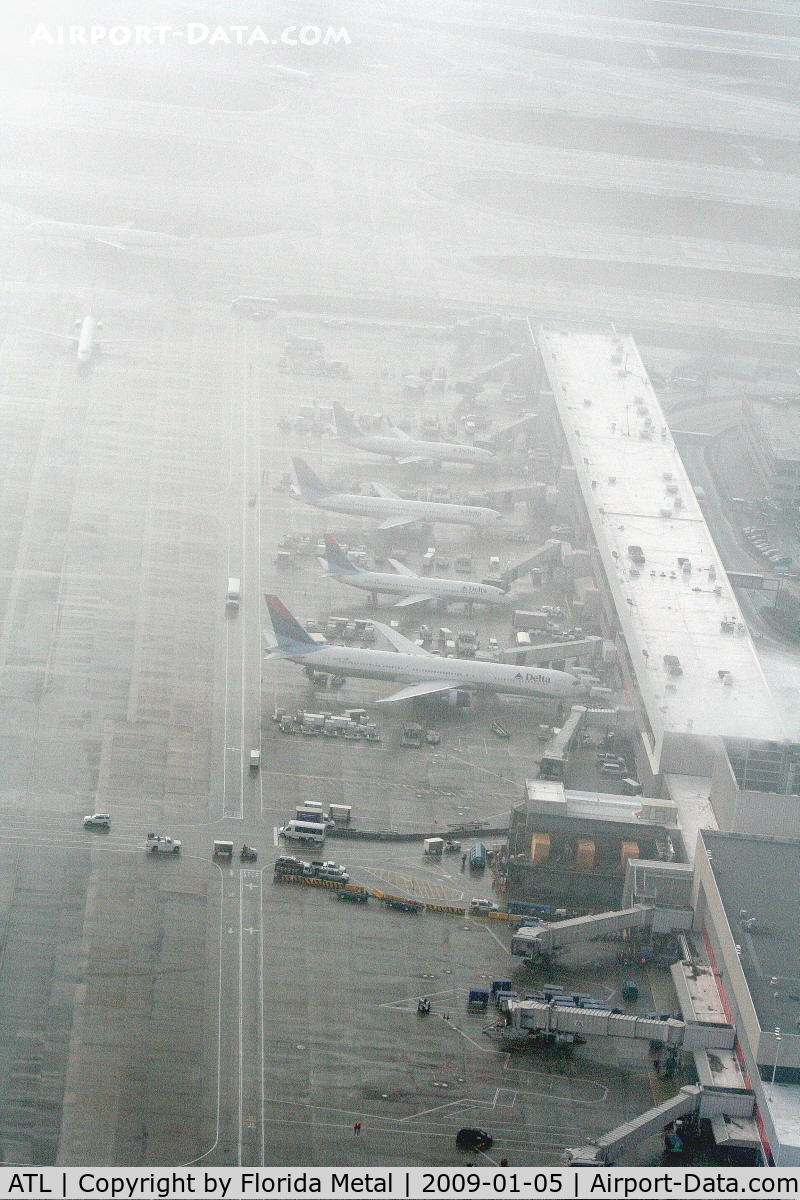 Hartsfield - Jackson Atlanta International Airport (ATL) - Concouse T in ATL and we are in the clouds