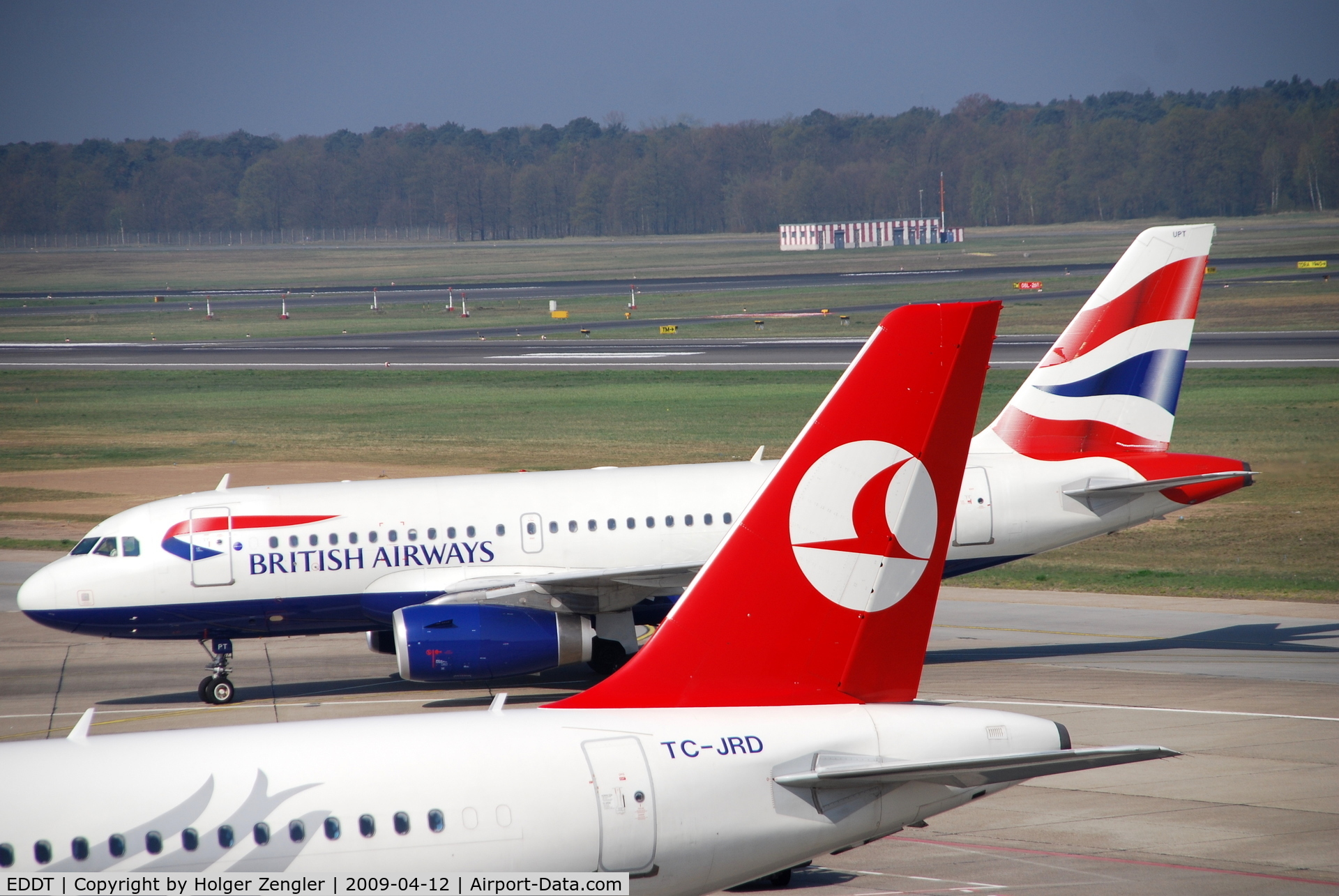 Tegel International Airport (closing in 2011), Berlin Germany (EDDT) - Sisters in red, blue and white