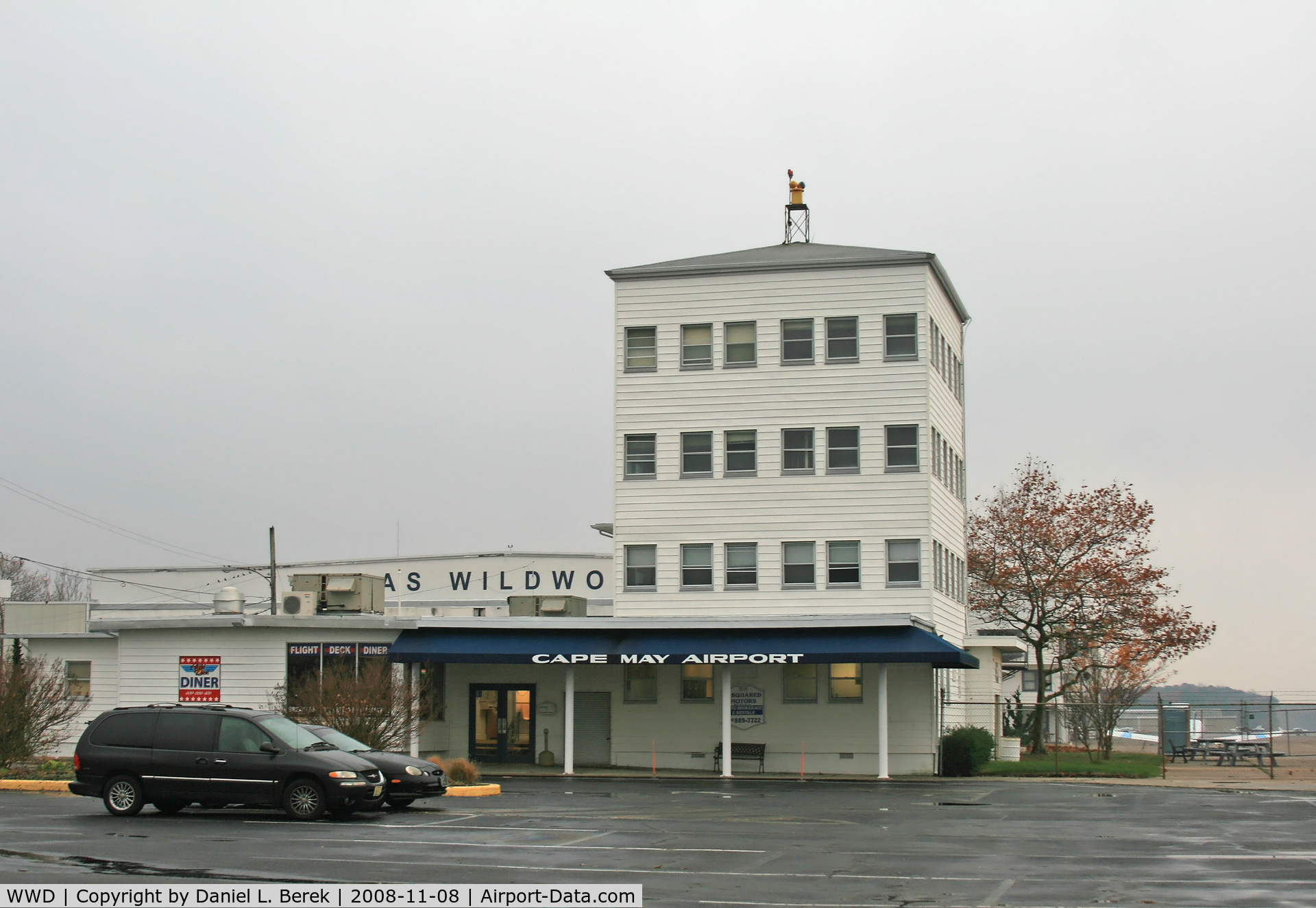 Cape May County Airport (WWD) - This is the main terminal and tower; behind is the historic hangar that gave the airport its original Wildwood name.
