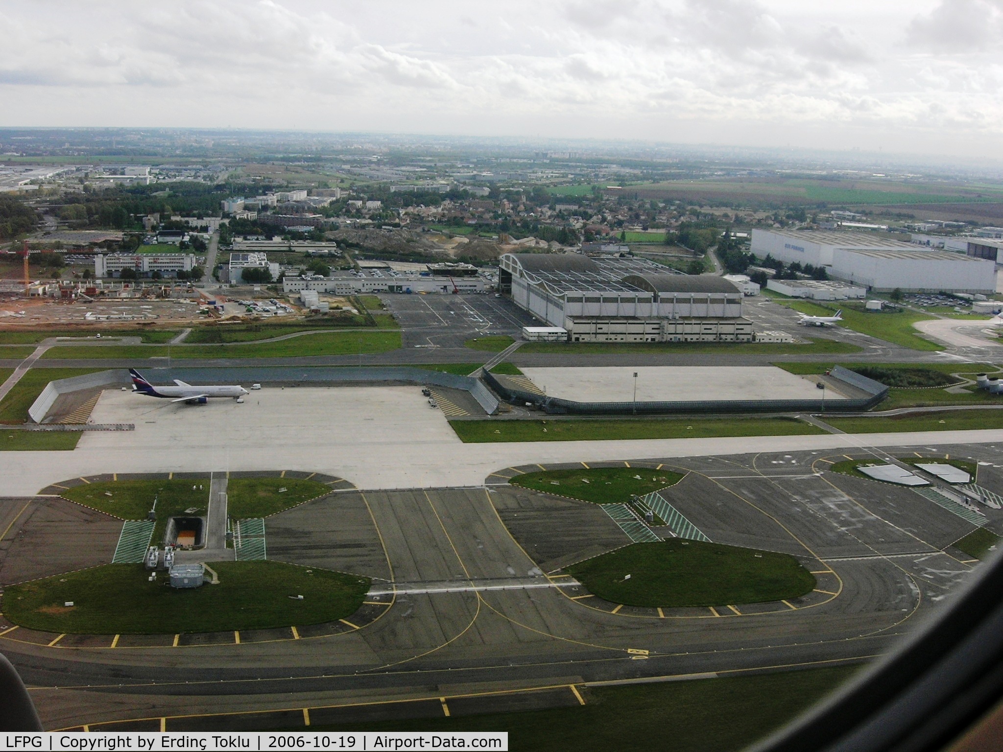 Paris Charles de Gaulle Airport (Roissy Airport), Paris France (LFPG) - Air France Maintenance seen from 27L/Paris in the back.
