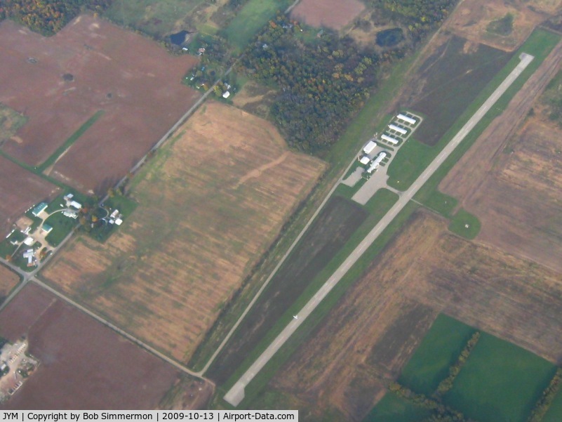 Hillsdale Municipal Airport (JYM) - View from 7500' with what looks to be an ultralight strip just north of the field.