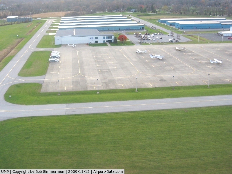 Indianapolis Metropolitan Airport (UMP) - Departing RWY 15 looking SW at the FBO.