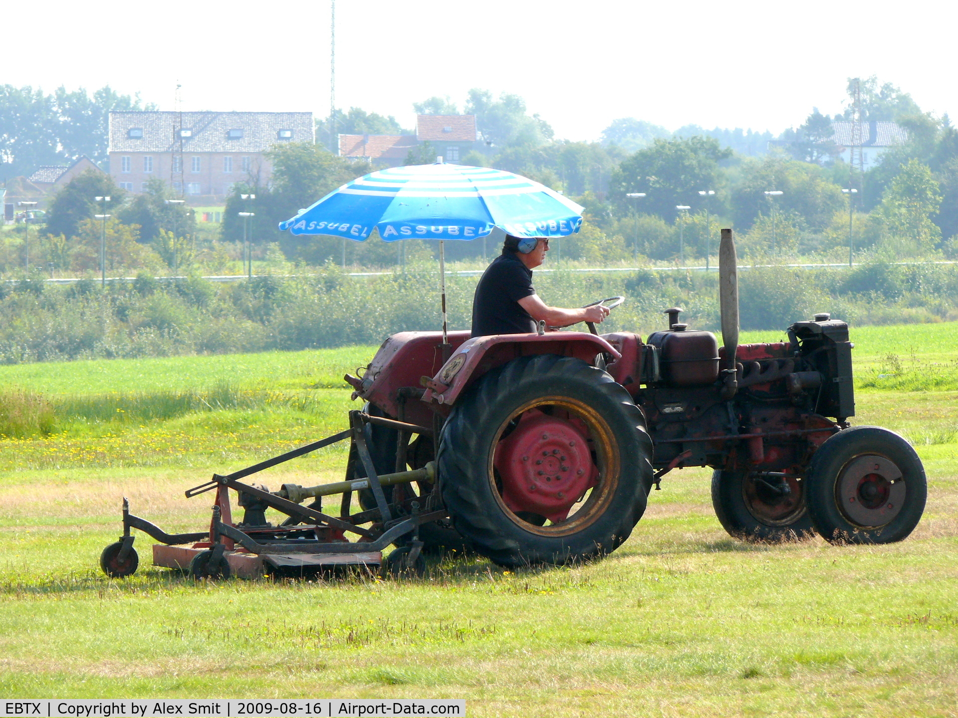 Verviers Airport, Theux Belgium (EBTX) - Mowing the lawn, it's tough job, but somebody 's got to do it.....