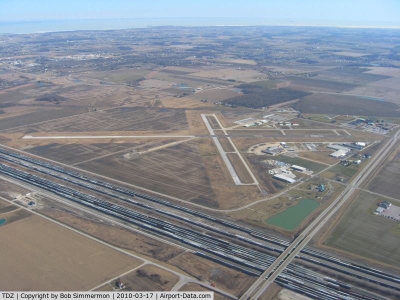 Toledo  Executive Airport (TDZ) - Looking NE with Lake Erie in visible in the distance.