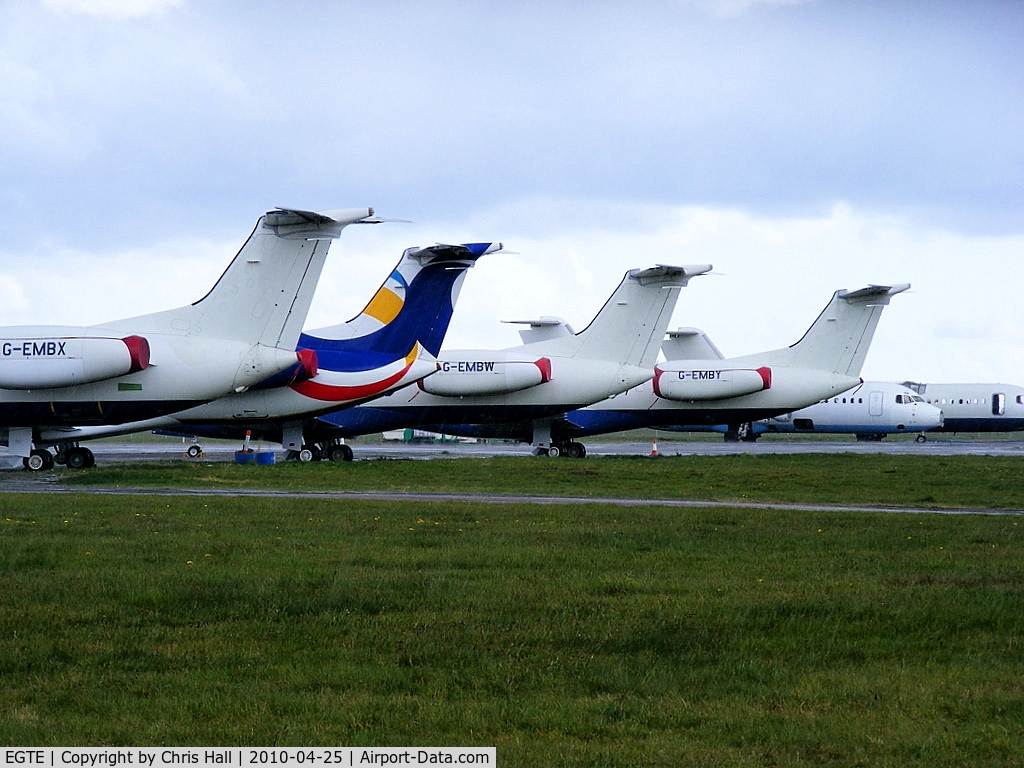 Exeter International Airport, Exeter, England United Kingdom (EGTE) - Embraer ERJ-145's and BAe 146's in storage at Exeter Airport