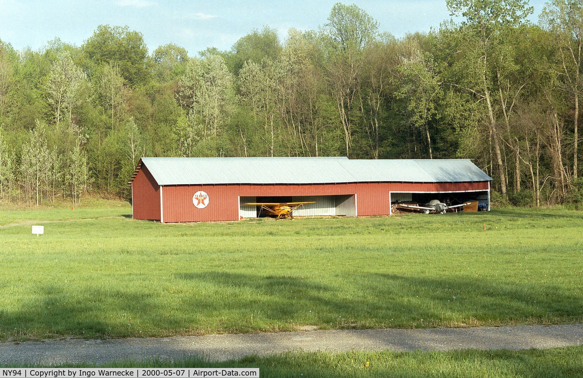 Old Rhinebeck Airport (NY94) - the red hangar across the field