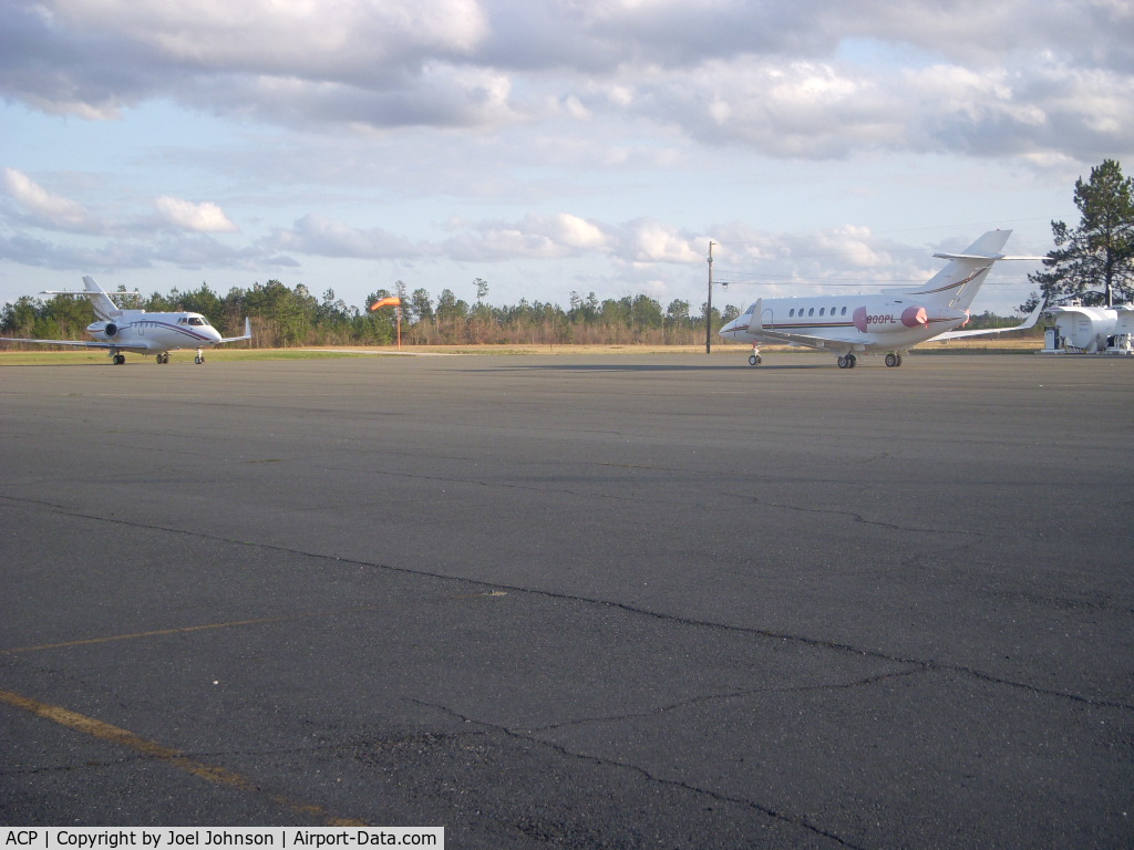 Allen Parish Airport (ACP) - Jet charters setting on ramp awaiting casino guest to return.