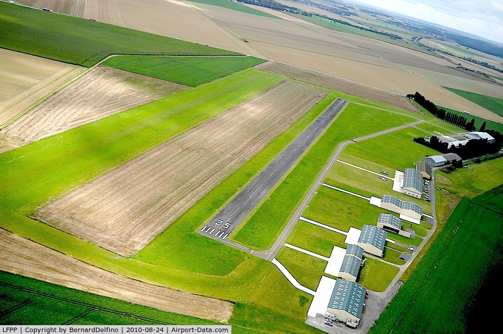 Le Plessis-Belleville Airport, Le Plessis-Belleville France (LFPP) - LFPG with work being carried out on grass runway, which explains its brownish color.