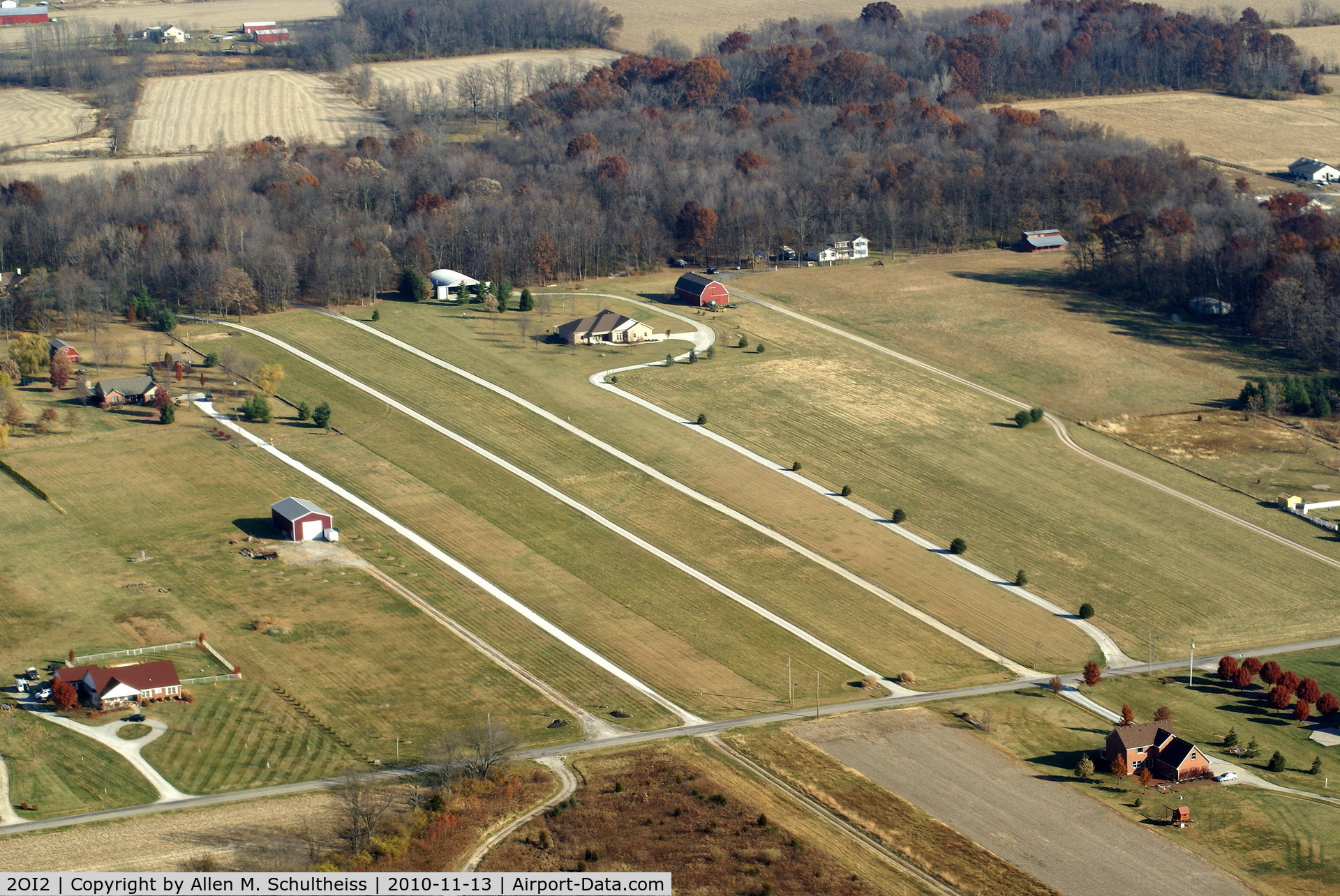 Air Jordan Airport (2OI2) - Looking NNE. Runway is at the left of the tree lined driveway that jogs around the house.