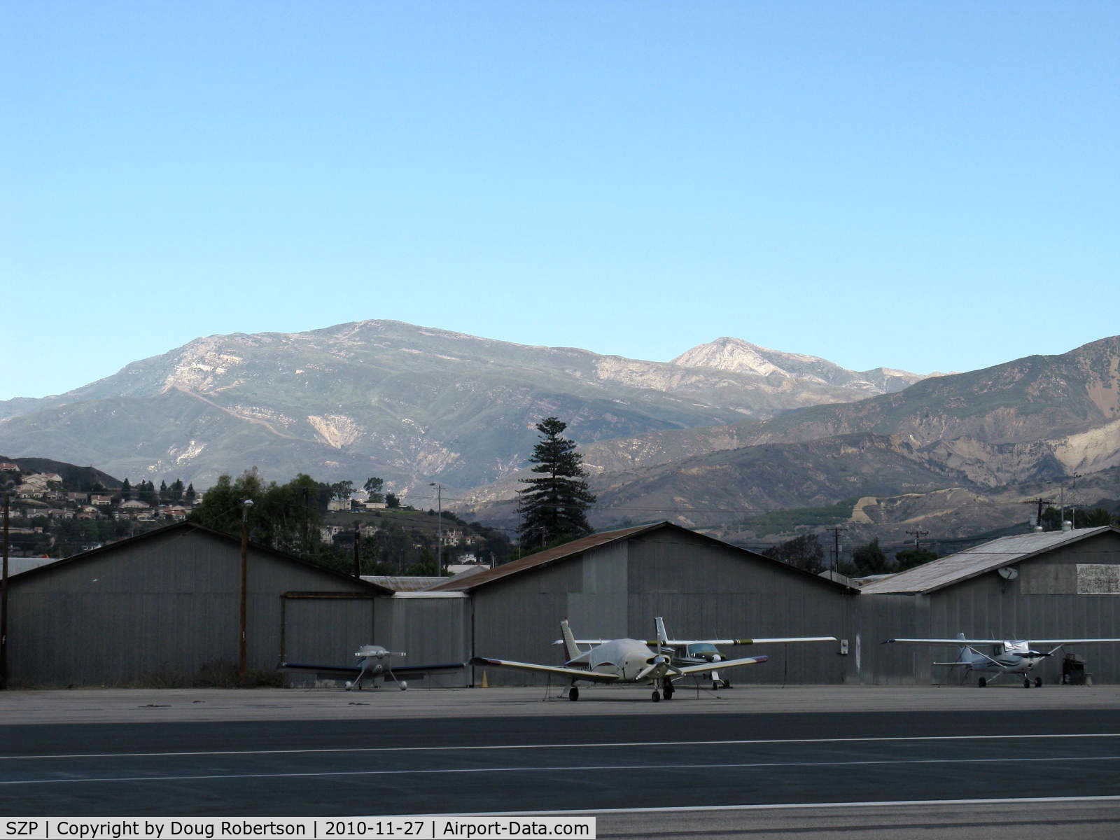 Santa Paula Airport (SZP) - Hines Peak 6,704' elev. in distance beyond frontal  peaks in Topa Topa Mountains, 6,244' elev. to left above Santa Paula