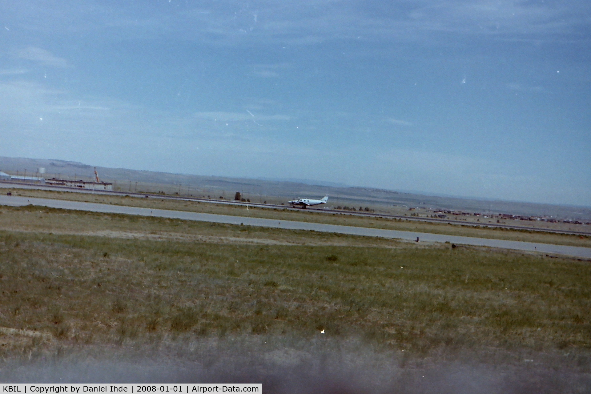 Billings Logan International Airport (BIL) - Twin Piper rolling down Billings Logan runway 27R in June of 1981